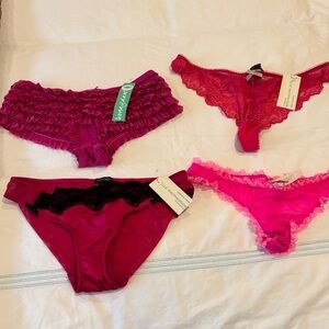 4 pairs of  Lace and Ruffle Panties all size Medium